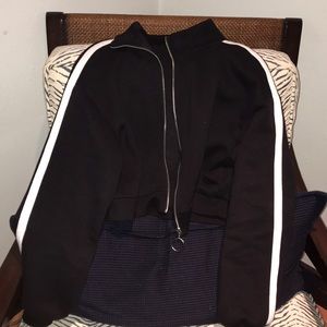 Cropped zip up black sweater with white stripe